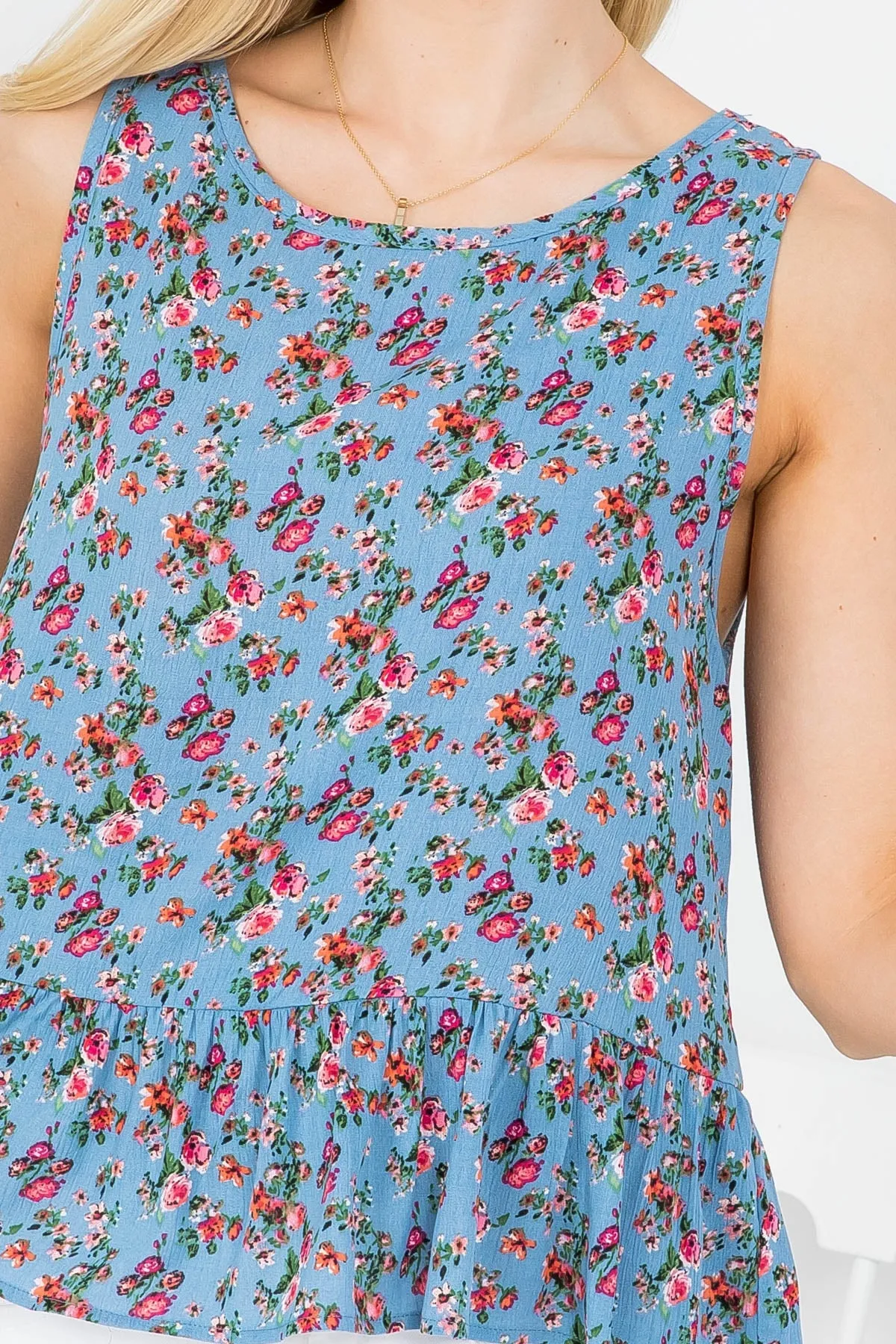 BLUE FLORAL PRINT ROUND NECKLINE RUFFLE BOTTOM SLEEVELESS TOP