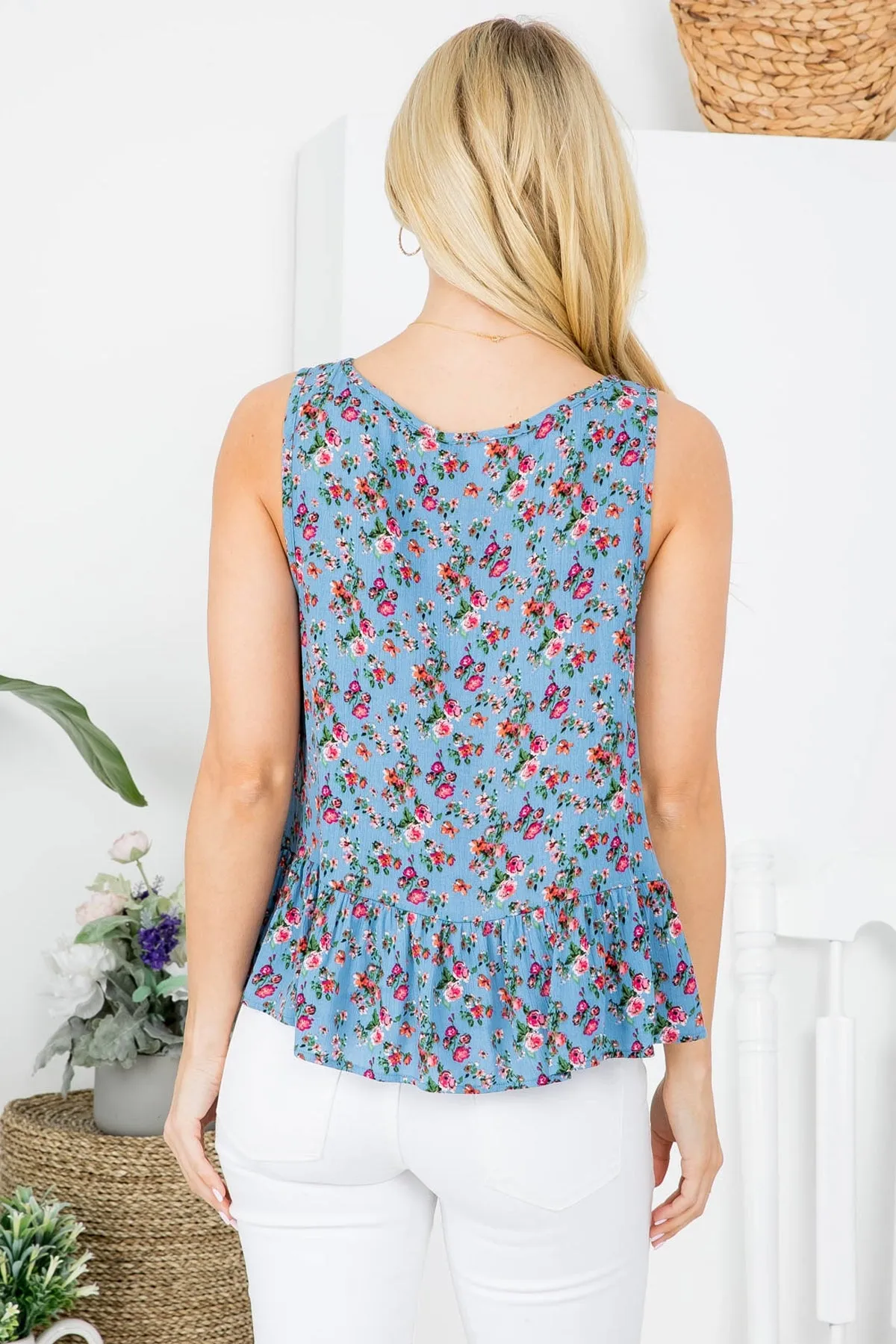 BLUE FLORAL PRINT ROUND NECKLINE RUFFLE BOTTOM SLEEVELESS TOP